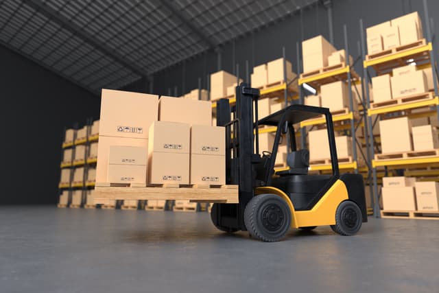 Forklift loading a truck